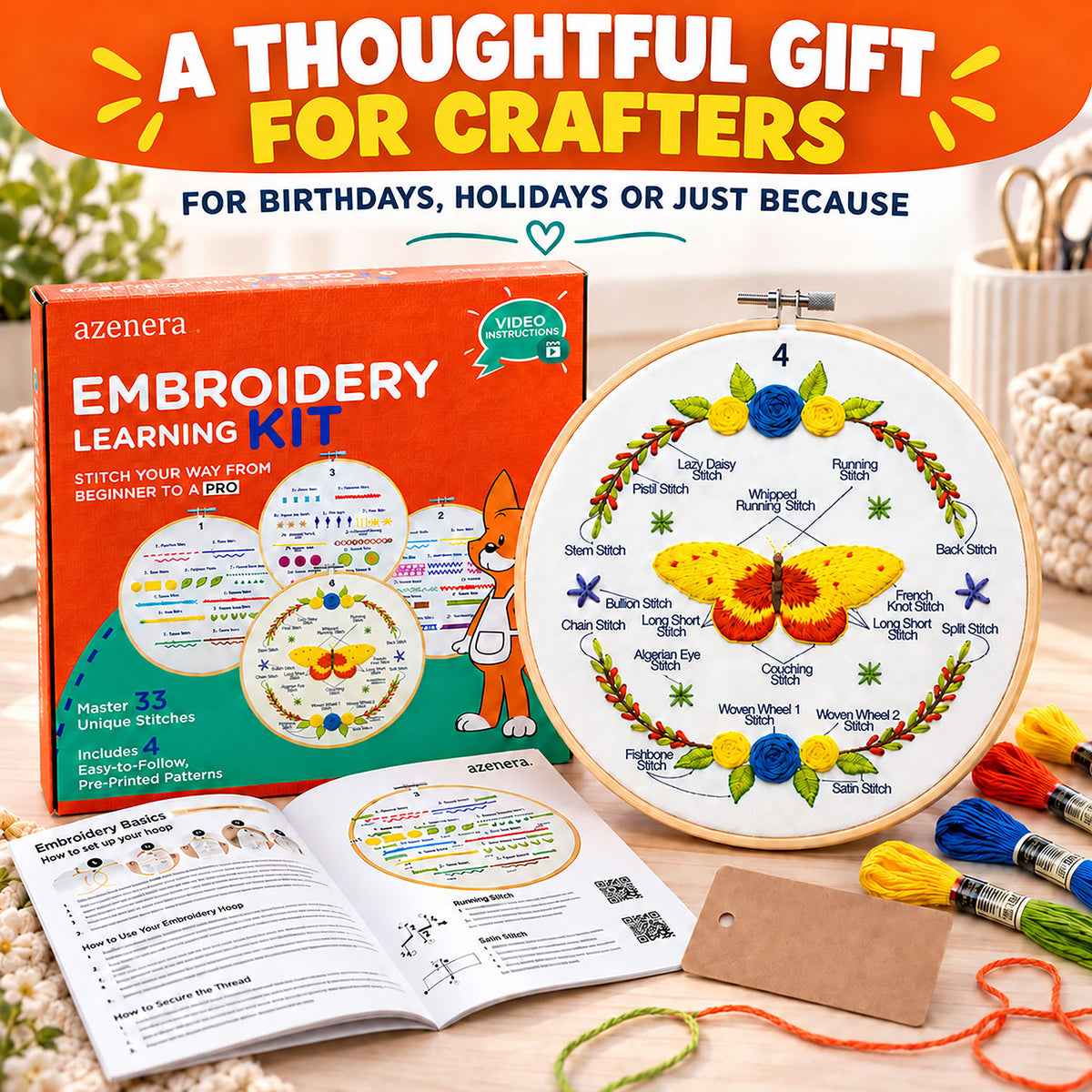 Azenera Embroidery Learning Kit shown with its orange retail box, an open instruction booklet, a hoop with a butterfly embroidery sample, and several colorful embroidery floss threads on a tabletop. Promotional text at the top reads, 'A THOUGHTFUL GIFT FOR CRAFTERS FOR BIRTHDAYS, HOLIDAYS OR JUST BECAUSE.